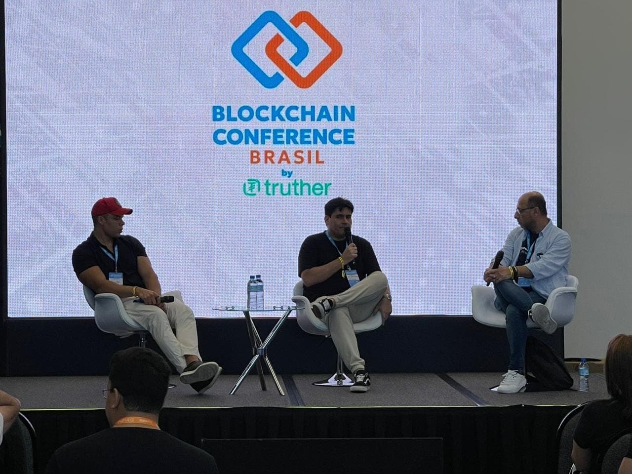 Panel on the Blockchain Conference Brasil stage