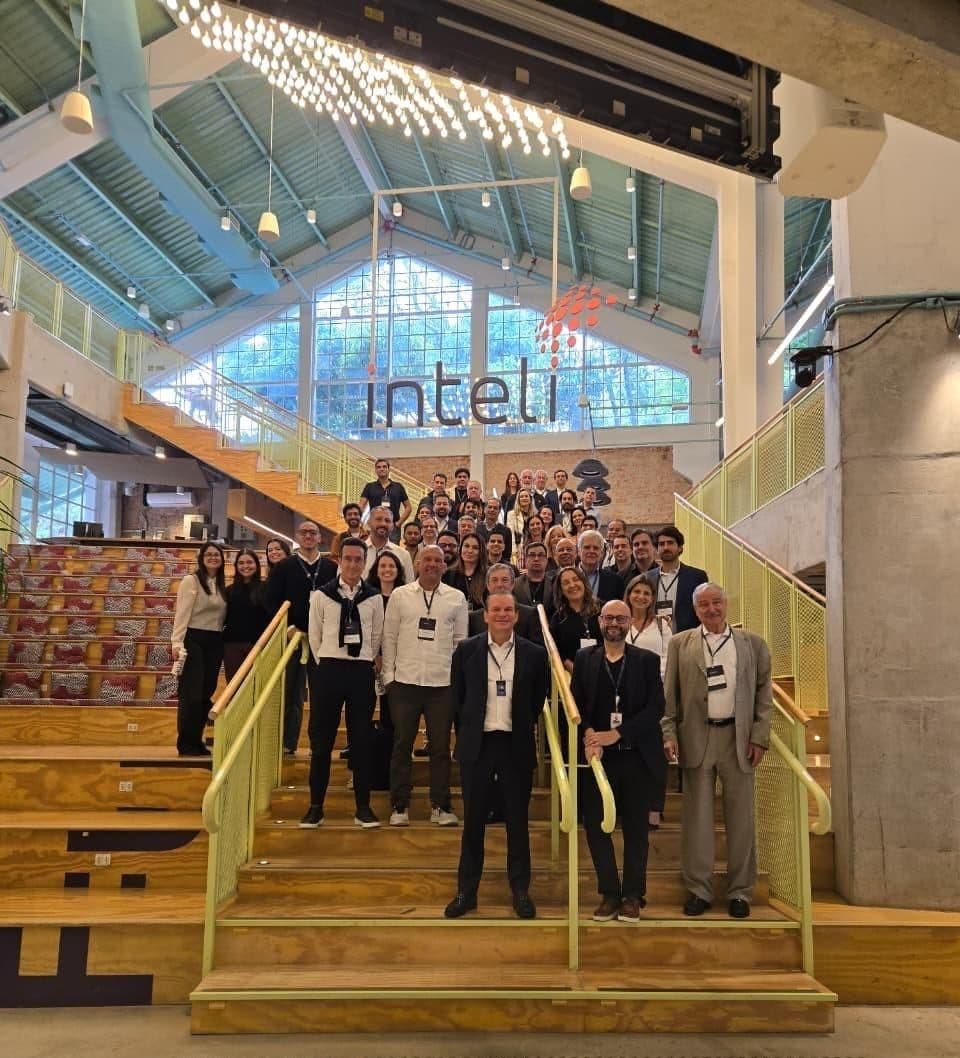 Participants gathered on the Inteli staircase, São Paulo