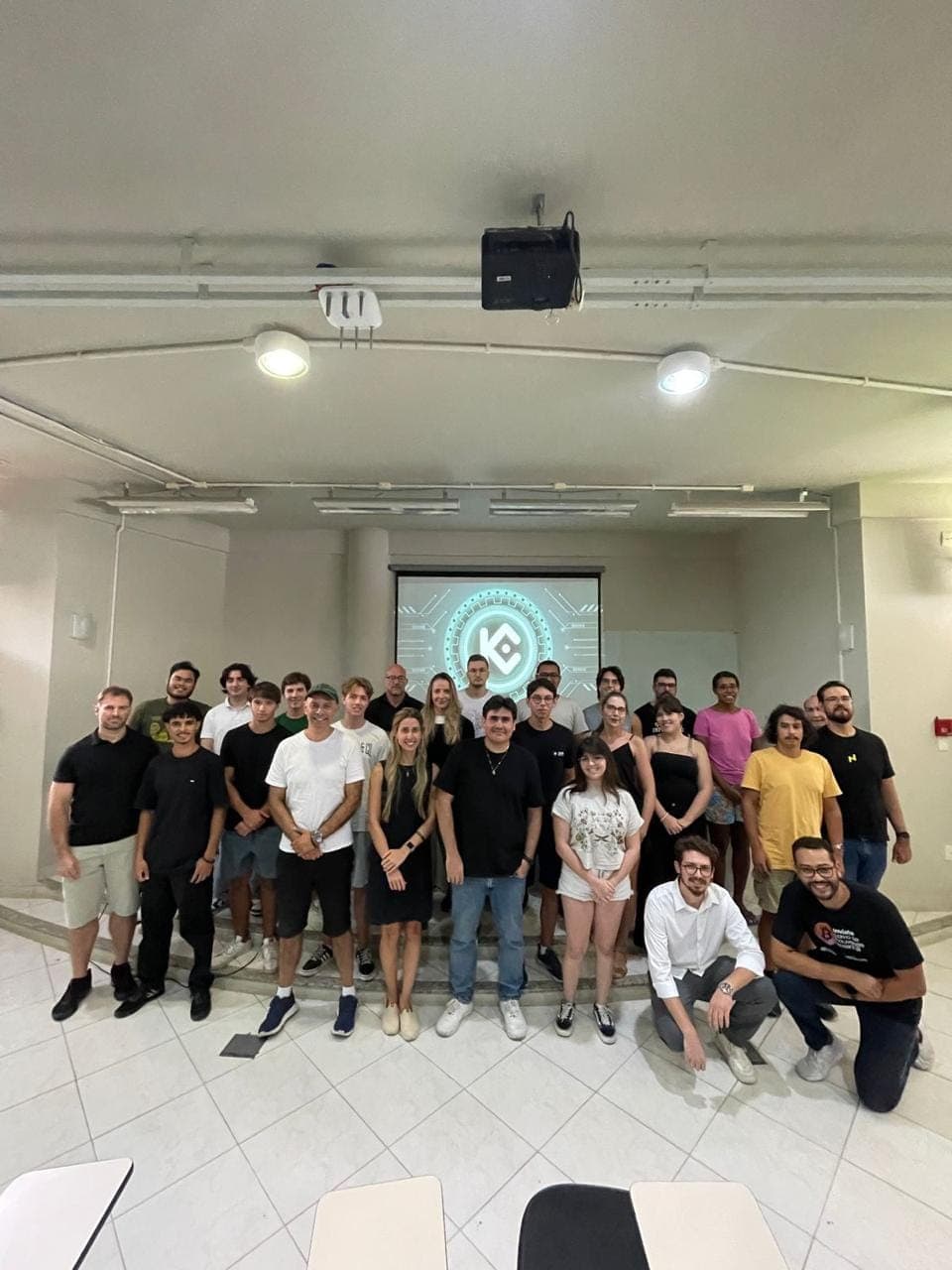 A class gathered in a classroom after a meetup